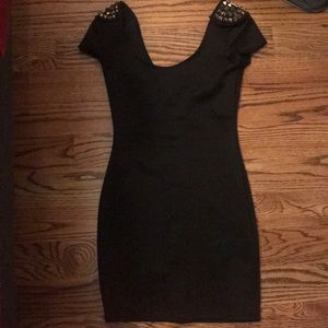 Black bodycon dress with studded shoulders